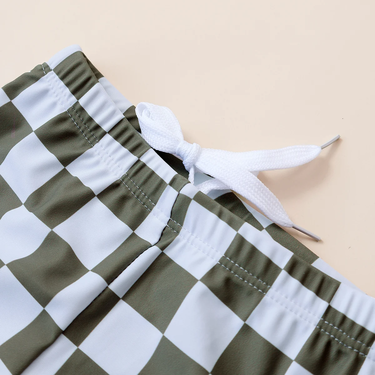 vêtement de bain bébé carreau vert